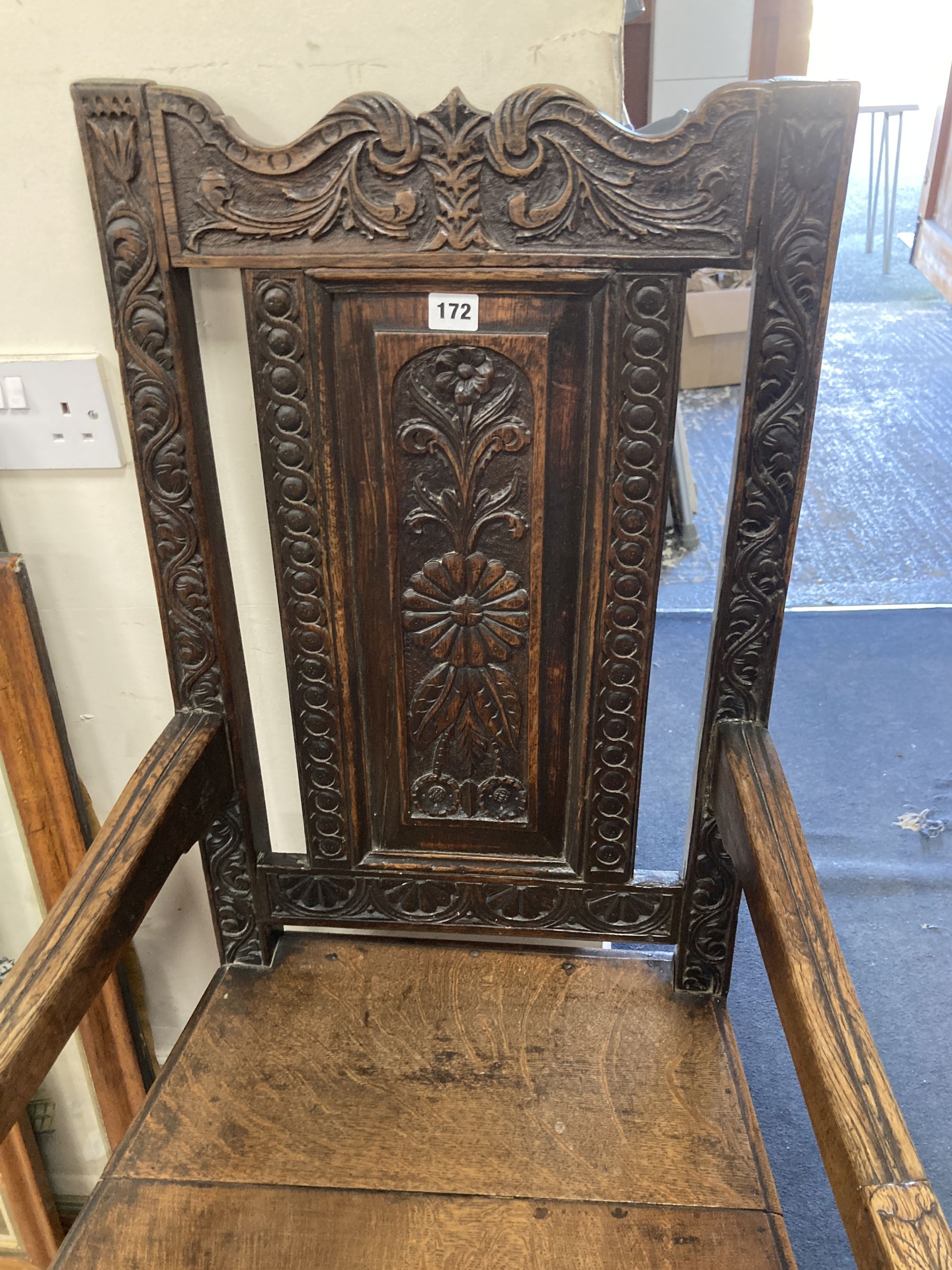 A 19th century oak Wainscot chair, width 64cm depth 49cm height 110cm